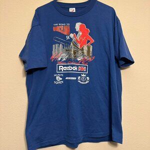 Vintage 1992 Reebok “Road To Barcelona 5K” New Orleans Blue Tee Size: XL